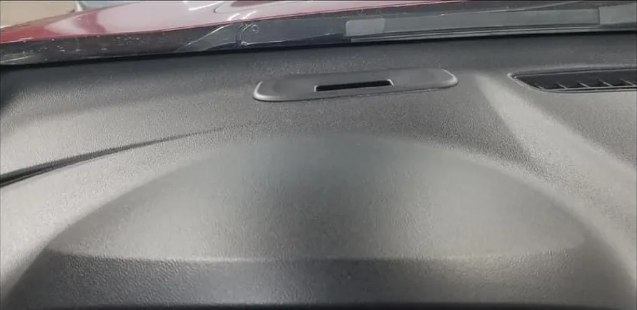 After: Dashboard surface damage