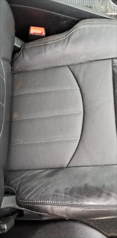 After: Worn leather seat
