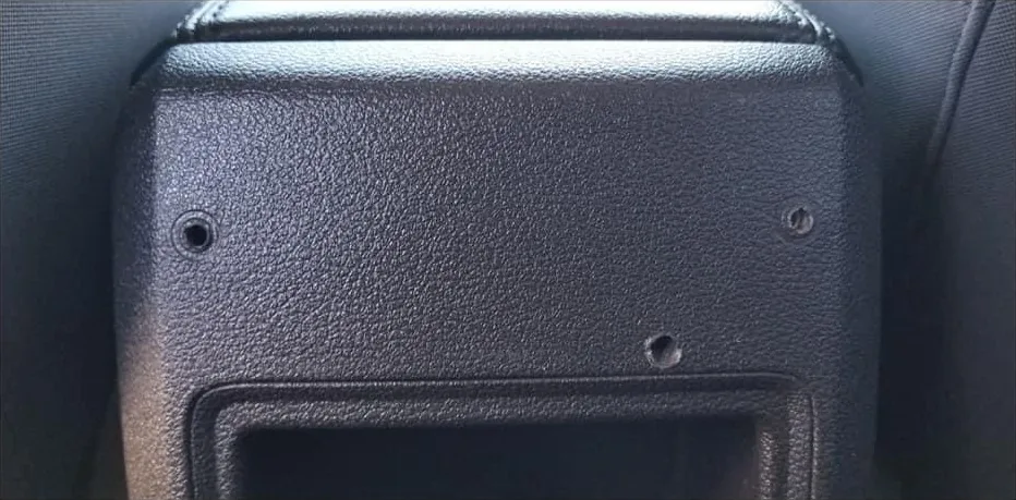 Before: Punctured plastic panel