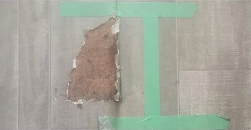 Torn linoleum floor