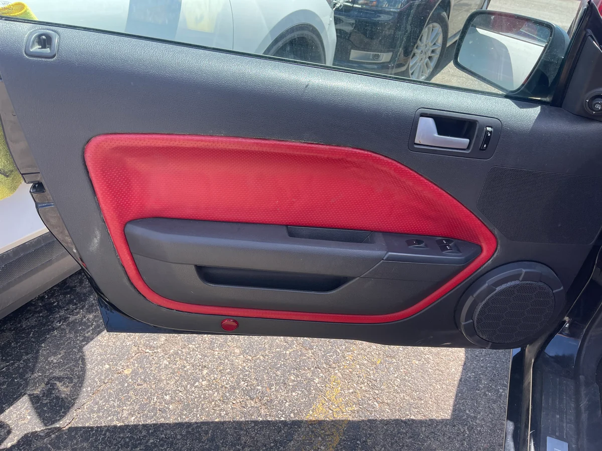 Door panel with its red insert restored