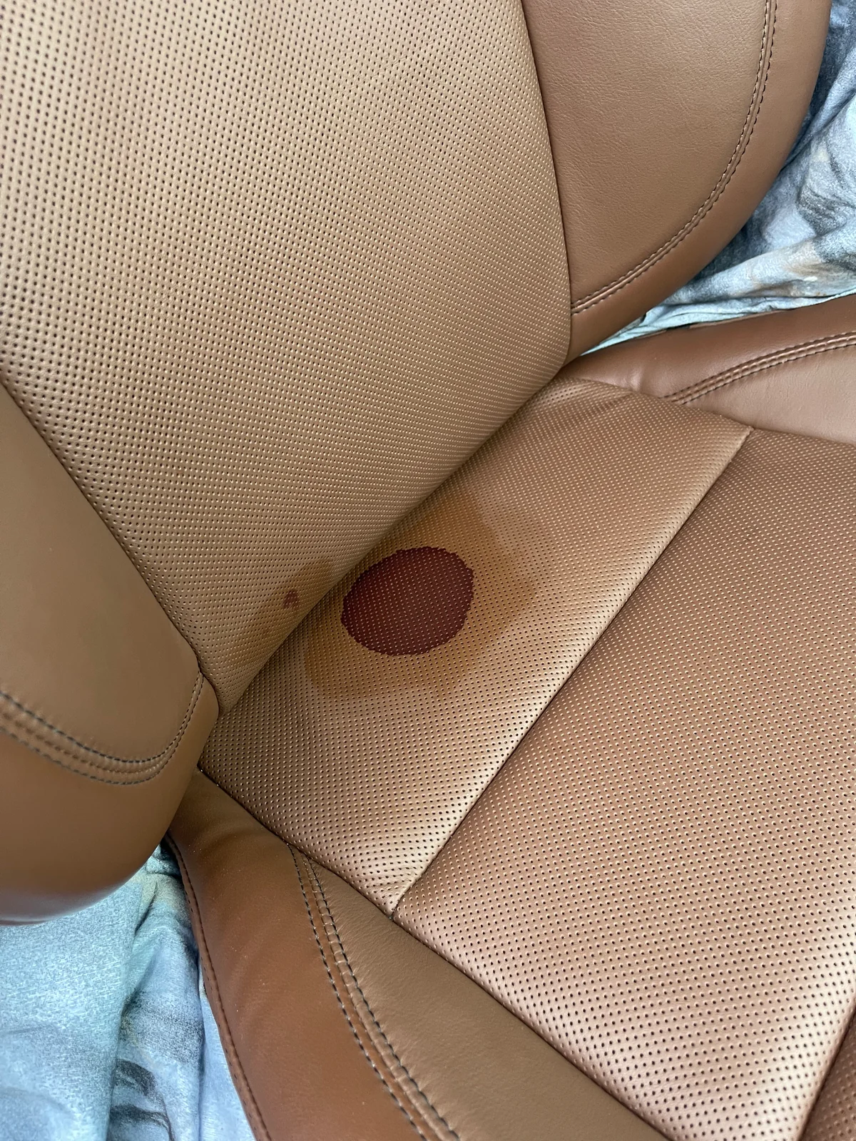 Before: Tan leather seat